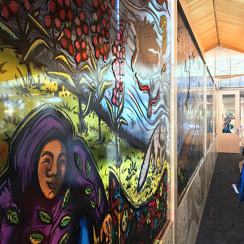 A vibrant mural covers the wall at the APK State Library, Archives & Museum in Juneau, Alaska. August 29, 2018. Credit: Rob Casper.