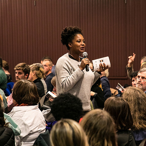 Tracy K. Smith engages the crowd in conversation about poems in 'American Journal' at the Lewiston Public Library in Lewiston, ME. November 1, 2018. Credit: Erik Peterson.