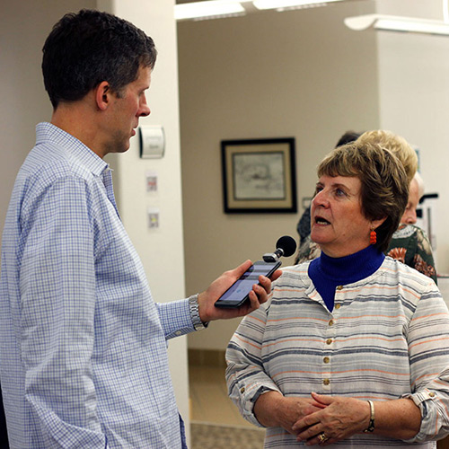 Rob Casper from the Library of Congress interviews Francie Ruebel-Alberts of Sturgis, SD, before Tracy K. Smith's 'American Conversations' event at the Sturgis Public Library in Sturgis, SD. October 6, 2018. Credit: Ryan Woodard.