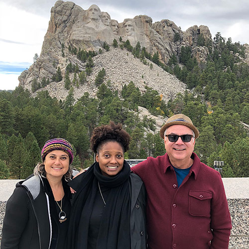 Tracy K. Smith visits Mount Rushmore with Shari Werb and Guy Lamolinara from the Library of Congress. October 4, 2018. Credit: Rob Casper.