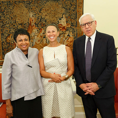 Debra Gittler, representing ConTextos, accepts the International Prize, presented by Librarian of Congress Carla Hayden and David M. Rubenstein.